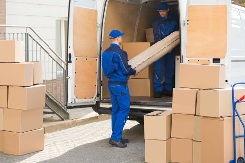 Staff member inspecting secure storage area at Stratford Storage