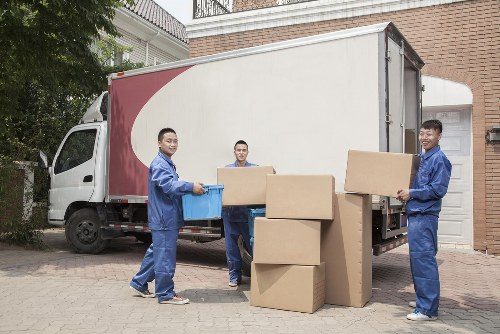 Professional removals team working in Stratford with moving van