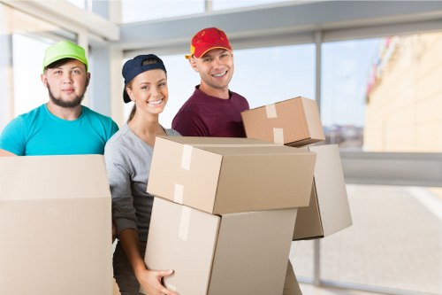 Family preparing household items for storage in Stratford during a home move