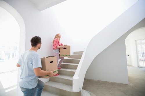 Carefully packed boxes and furniture ready for house removals in Stratford